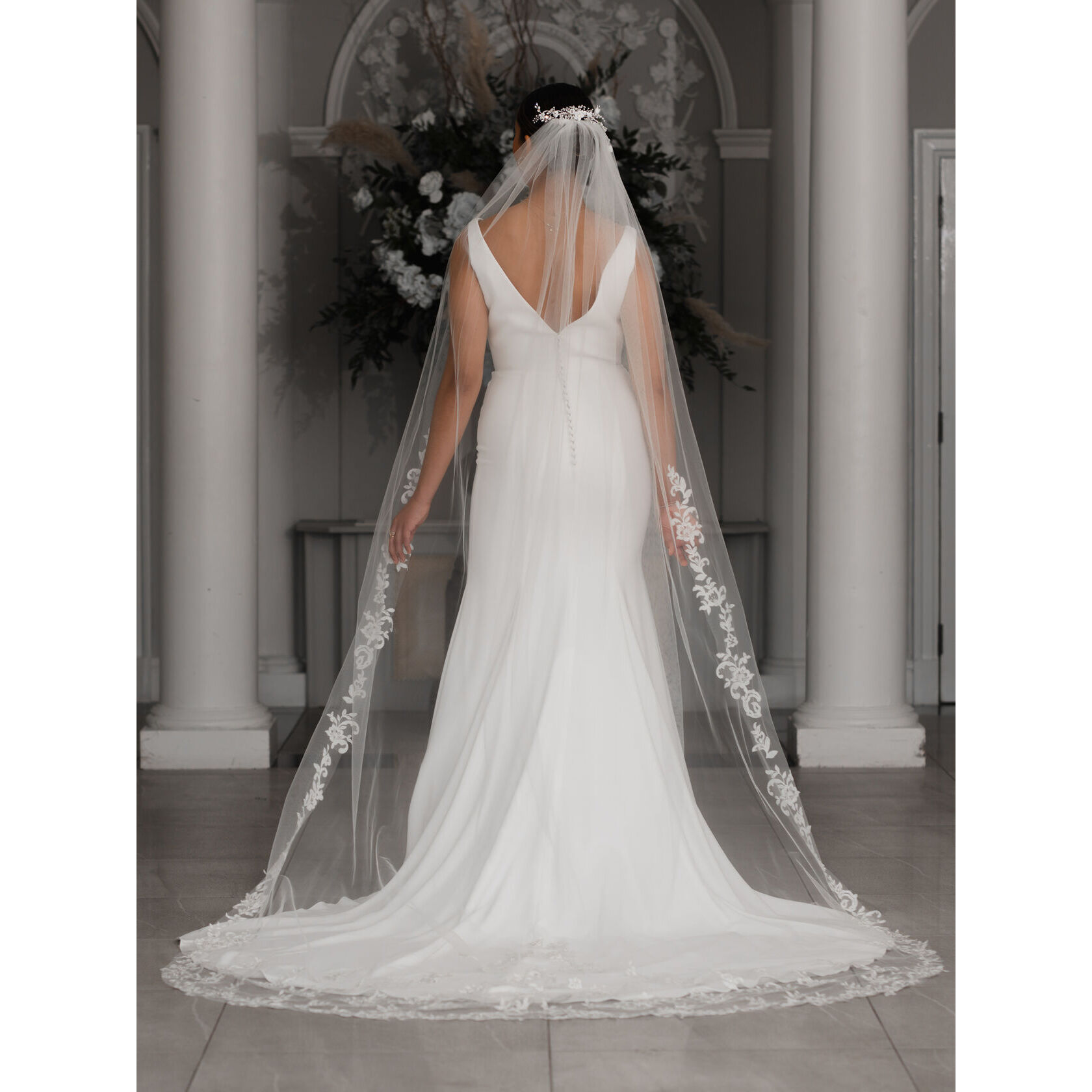 Single tier long ivory tulle veil with a beaded lace edge